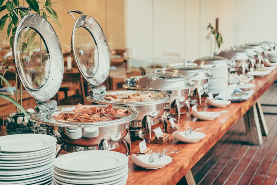 Catering team preparing dishes for an event