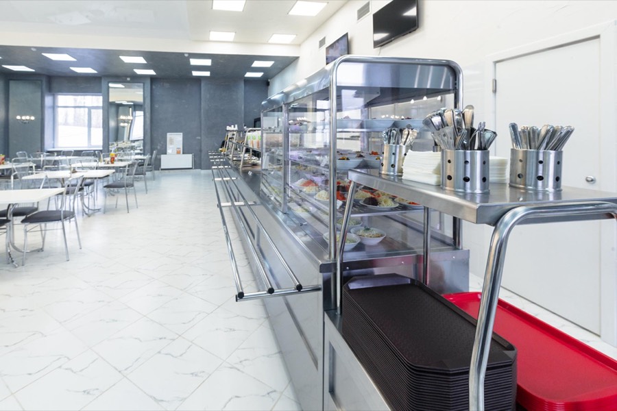 Hospital catering kitchen preparing patient meals